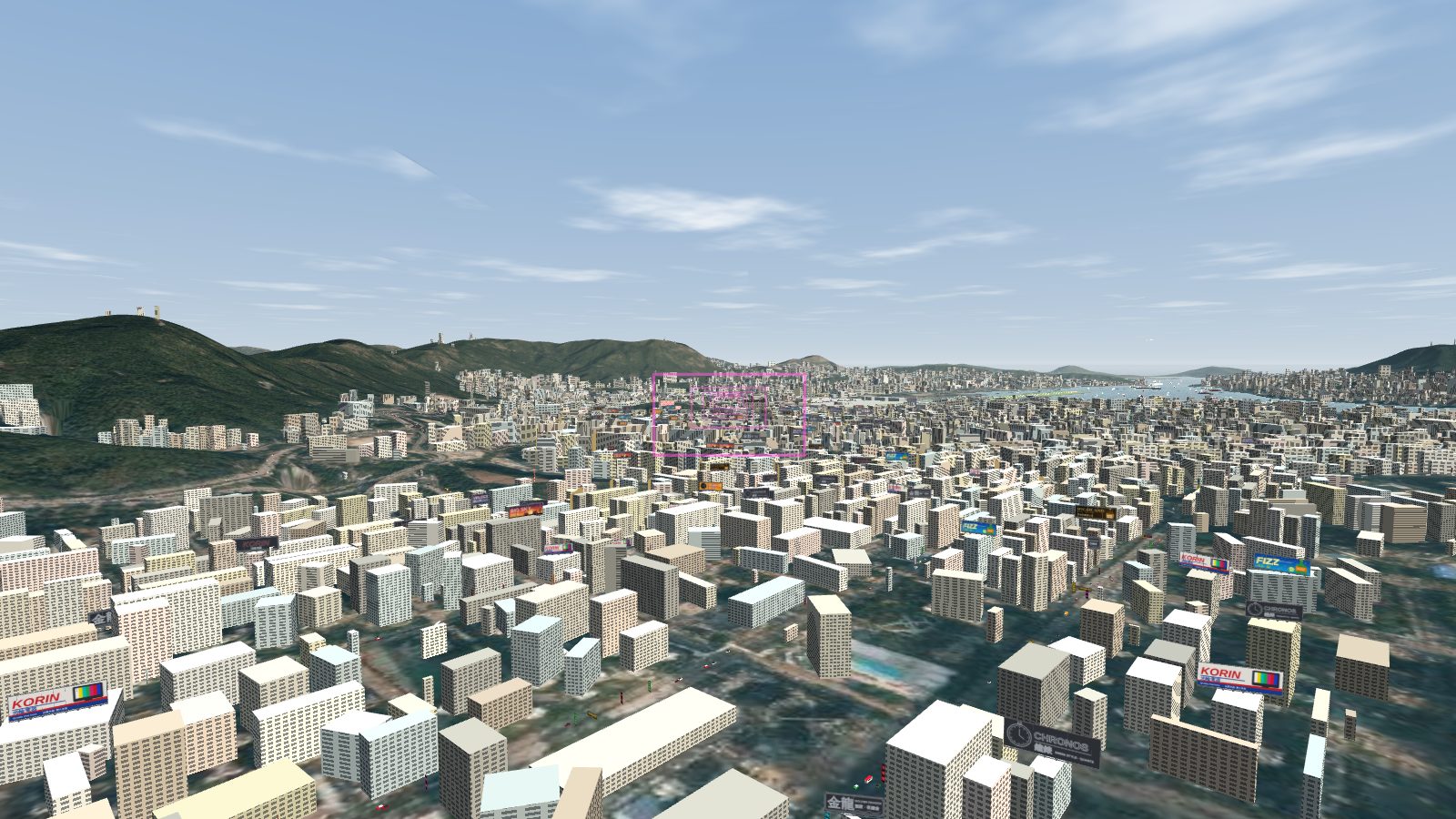 Daytime view over Kowloon with billboards on the rooftops for electronics, a soft drink, a watch and a car.