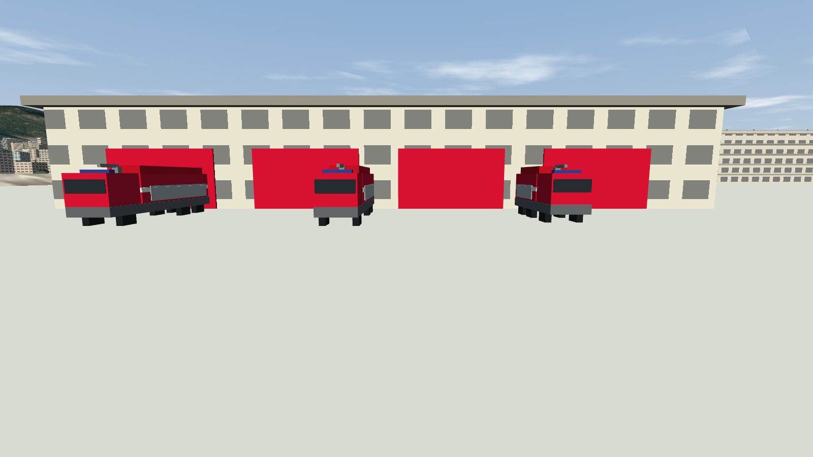 Fire tenders and a rescue vehicle outside the fire station.