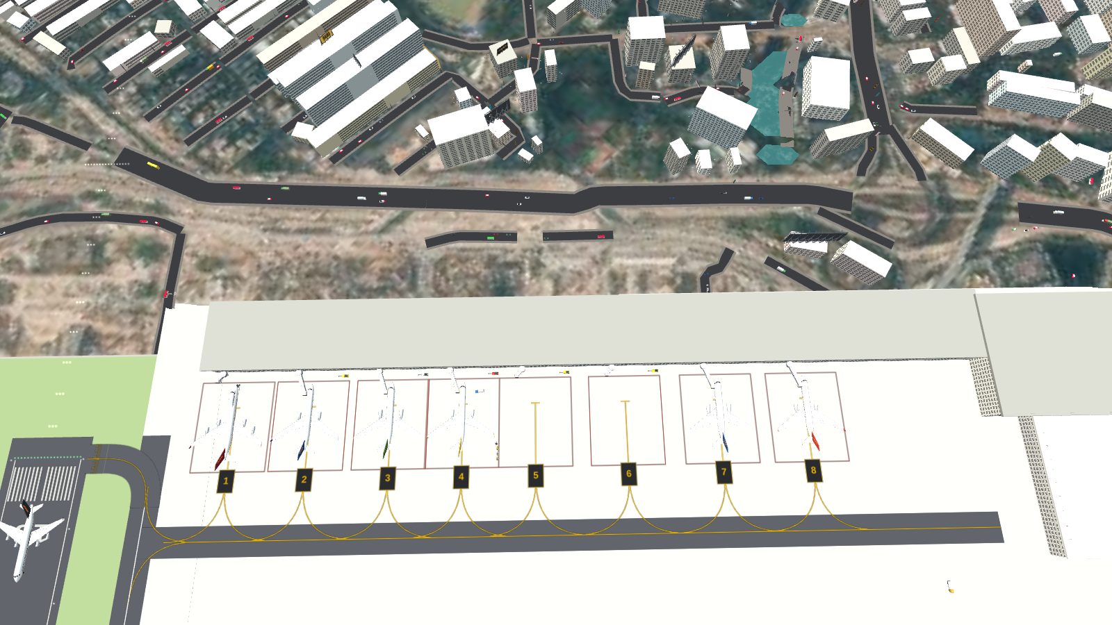 Aircraft at stands 1 to 8 with stand numbers painted at the lead-ins, and an aircraft being pushed back at stand 5.