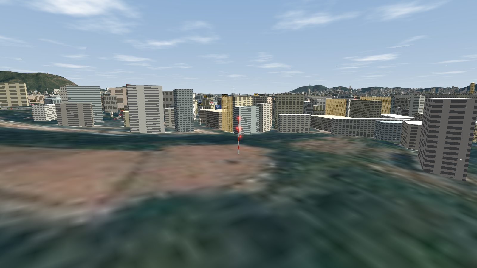 The red-and-white Garden Hill obstacle beacon in Sham Shui Po.