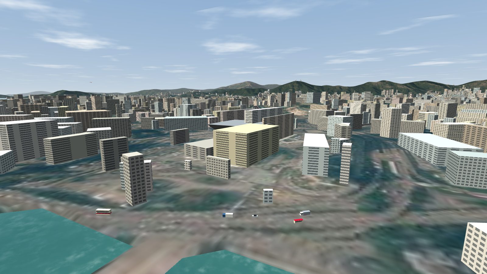 The inverted-pyramid Hung Hom Coliseum among the Hung Hom blocks.