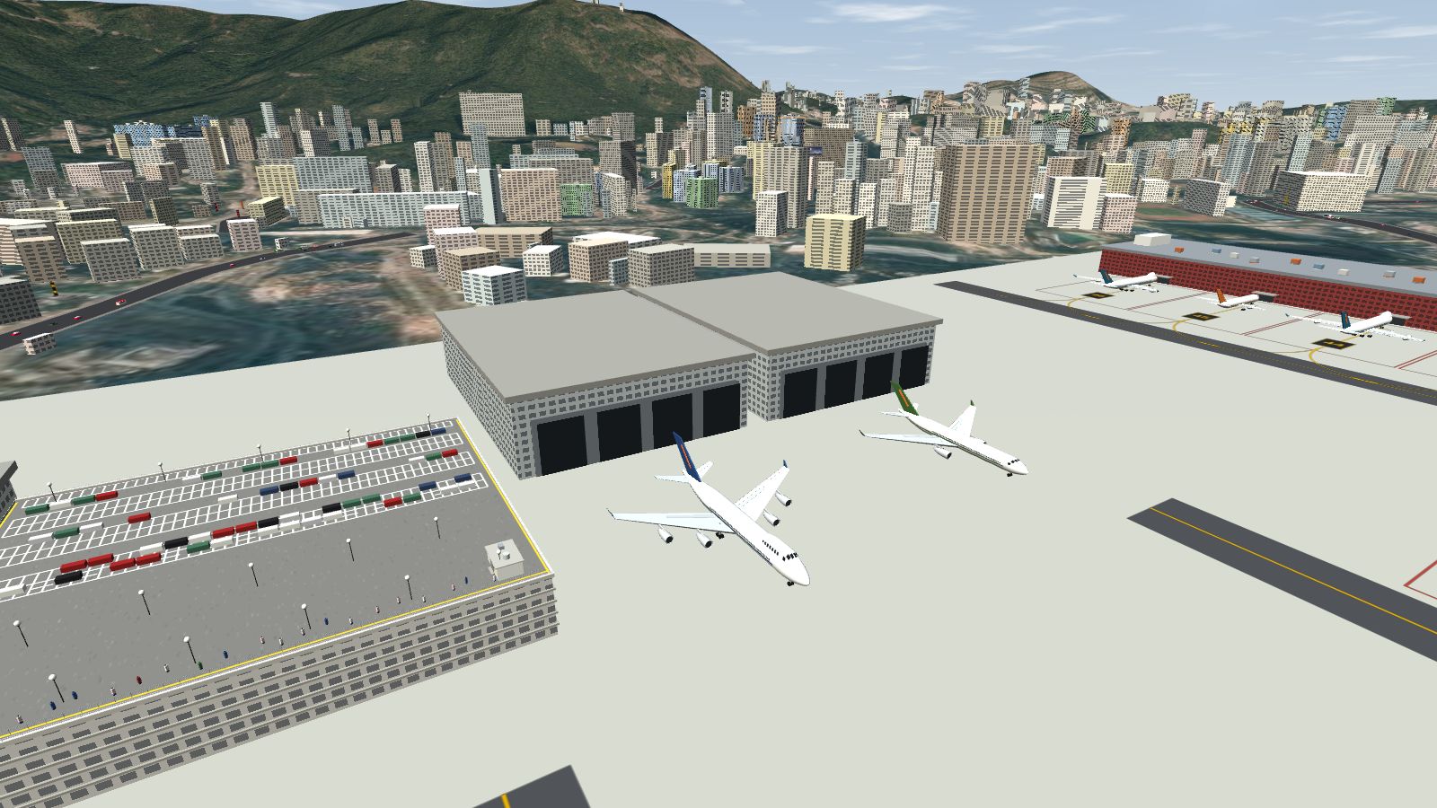 Two grey maintenance hangars with open door bays, two aircraft in front, and the car park roof on the left.