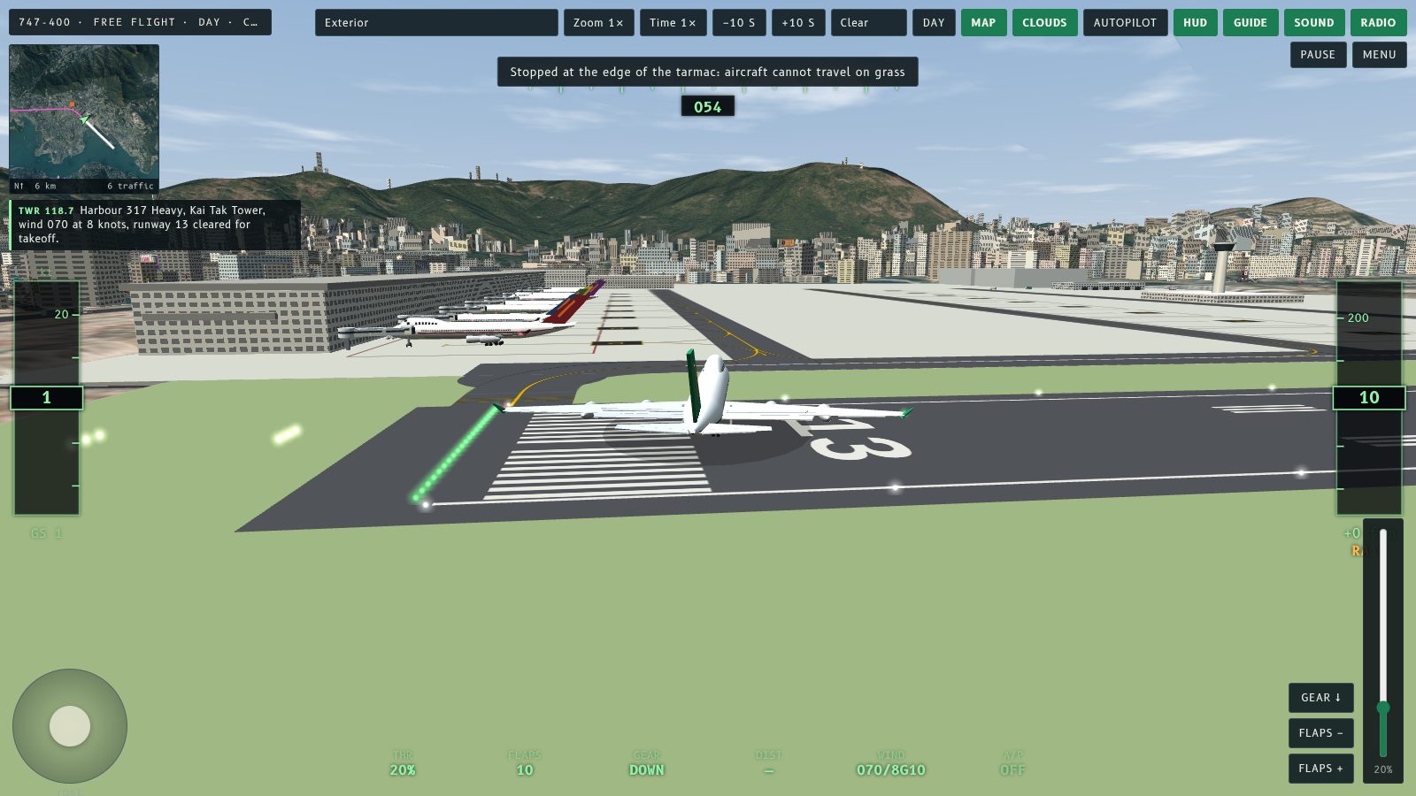 A 747 turned across the runway and stopped at the tarmac edge, with the message that aircraft cannot travel on grass.