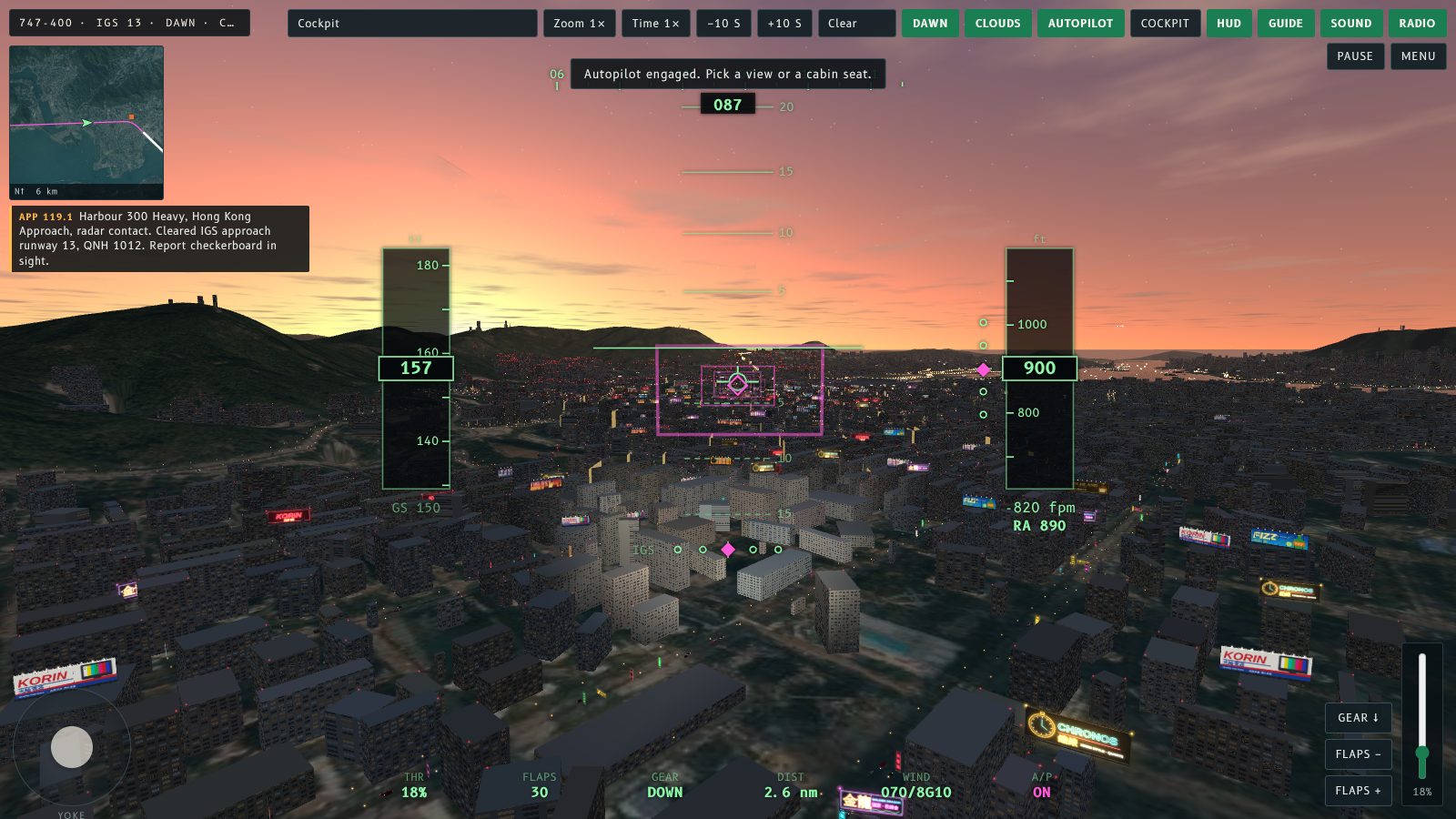 Cockpit view on the IGS approach at dawn, with an orange sky over Kowloon.
